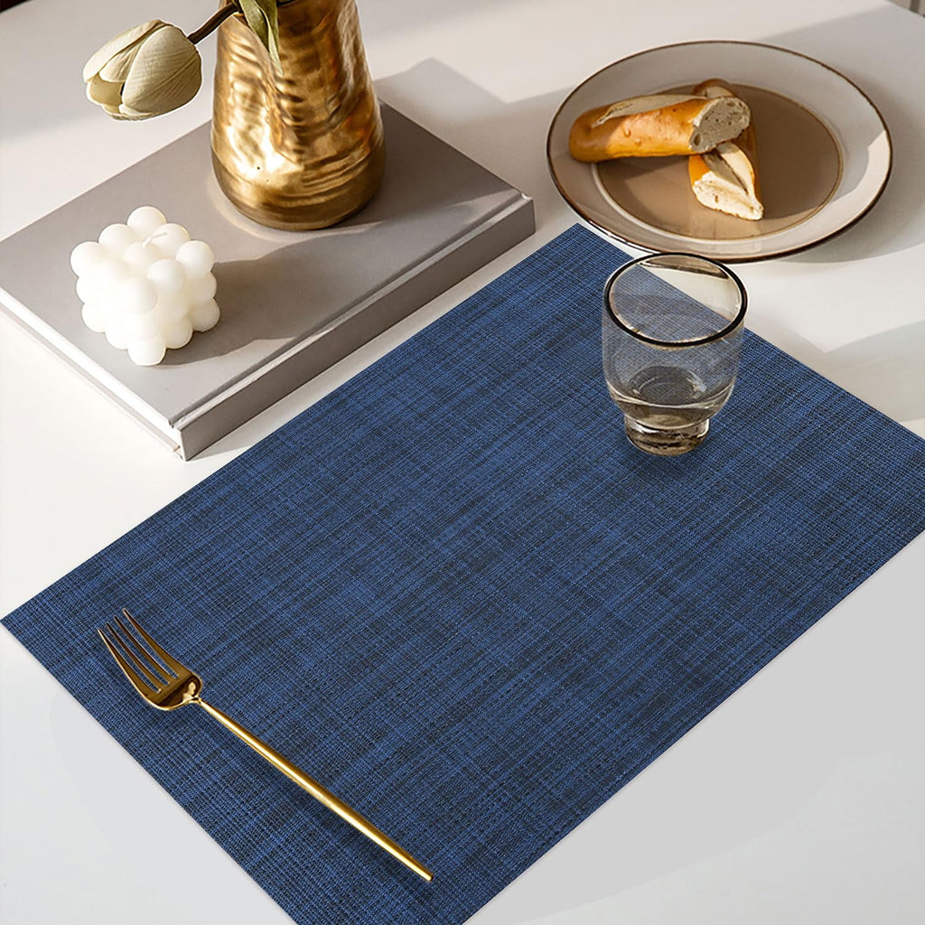 Heat resistant placemats set of 4, PVC woven washable non-slip table mats, wrinkle free vinyl placemats for dining, modern kitchen decor, navy blue