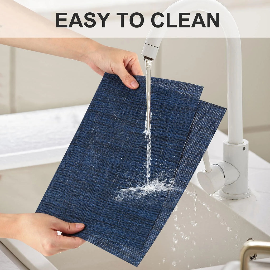 Heat resistant placemats set of 4, PVC woven washable non-slip table mats, wrinkle free vinyl placemats for dining, modern kitchen decor, navy blue